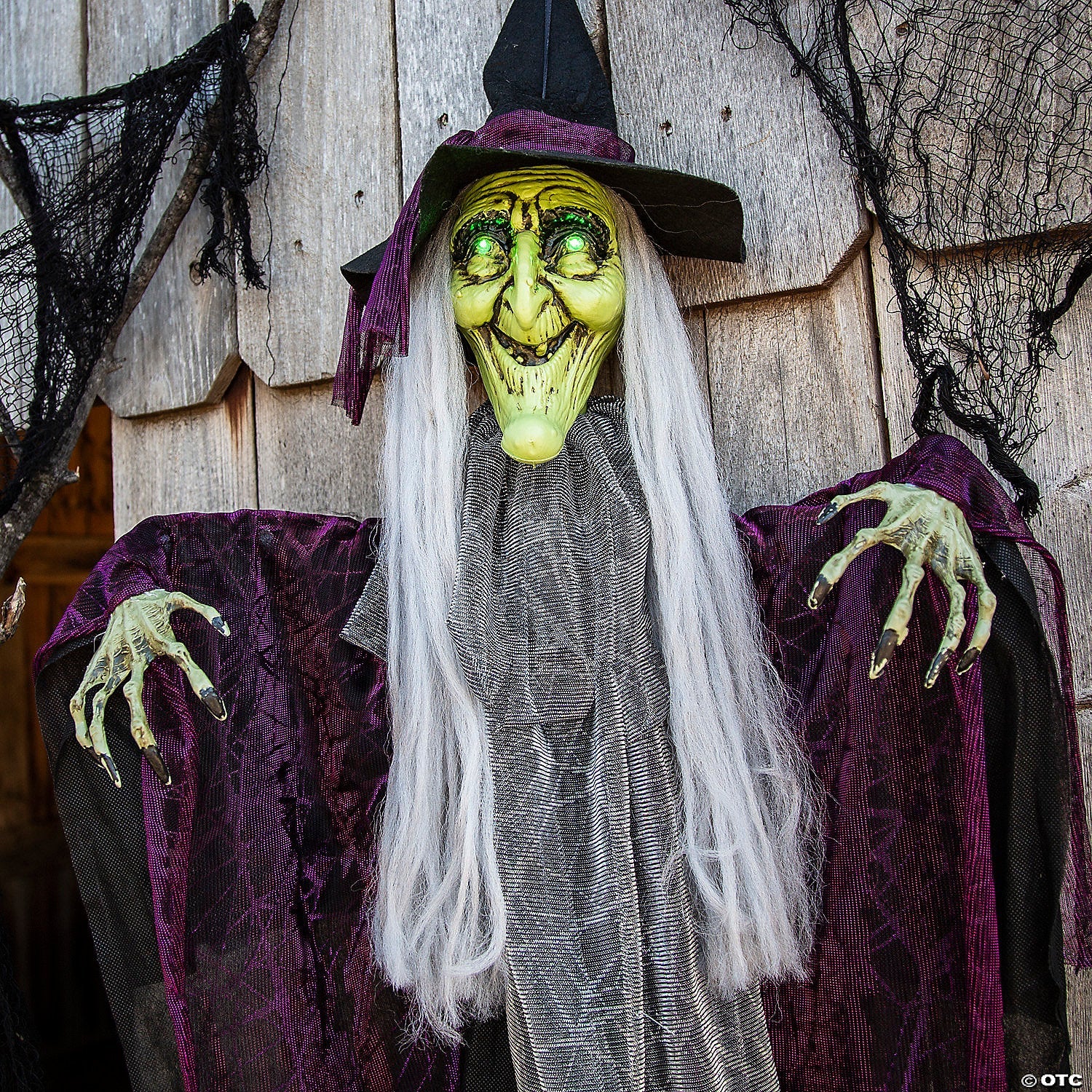 4 Ft. Hanging Witch with Green Eyes Animated Prop Halloween Decoration