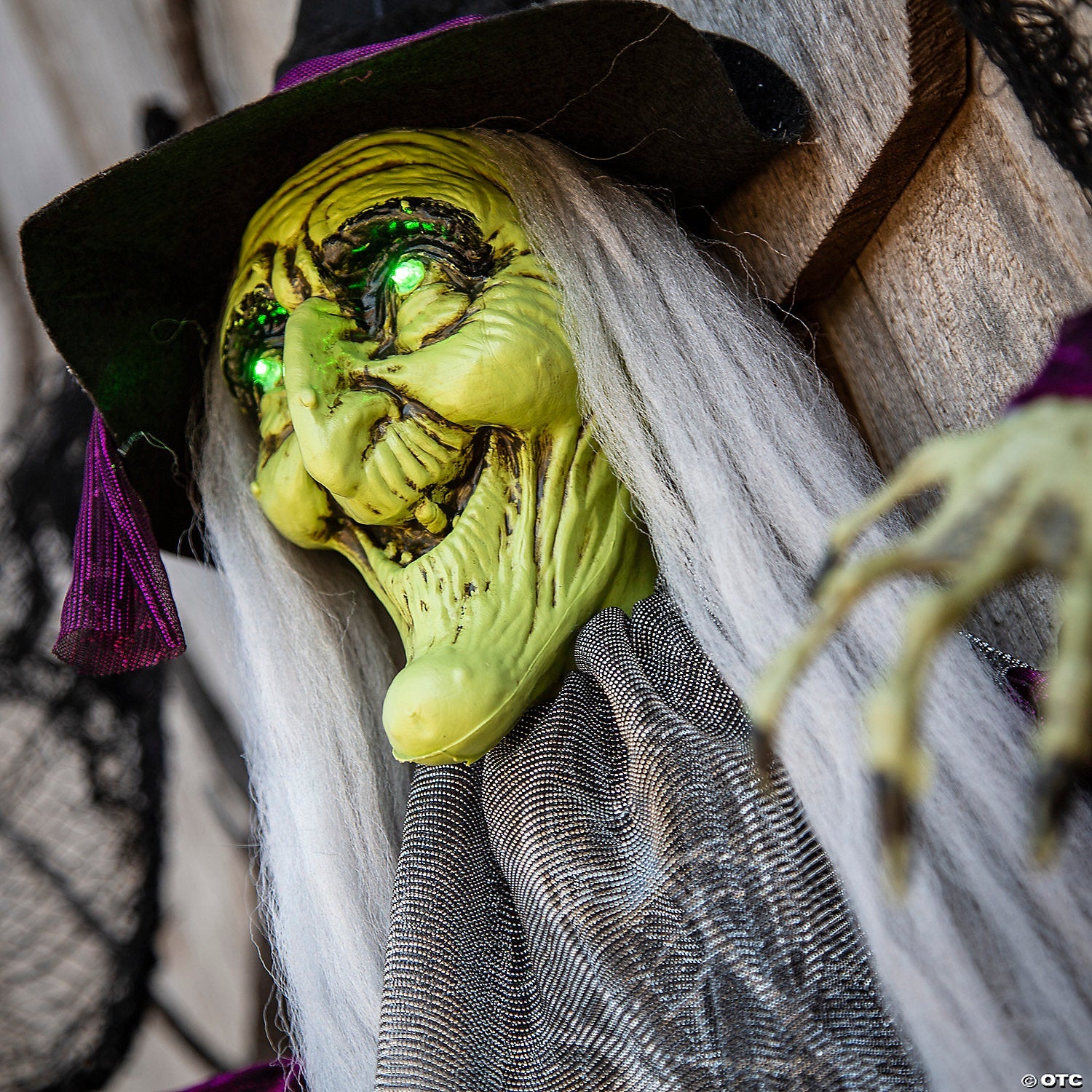 4 Ft. Hanging Witch with Green Eyes Animated Prop Halloween Decoration