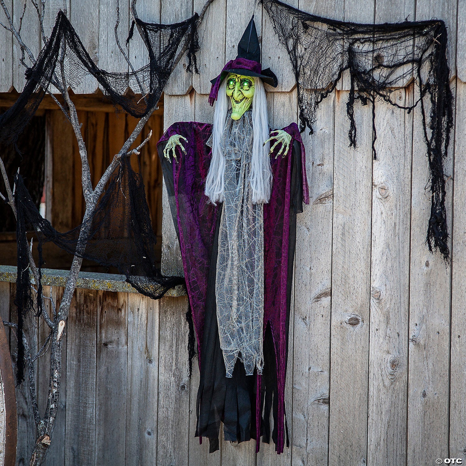 4 Ft. Hanging Witch with Green Eyes Animated Prop Halloween Decoration